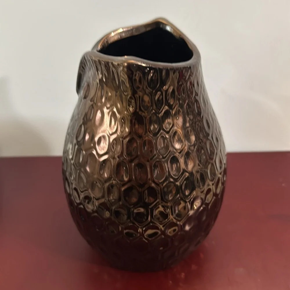 Copper/Bronze colored ceramic owl vase with a dimpled, metallic finish